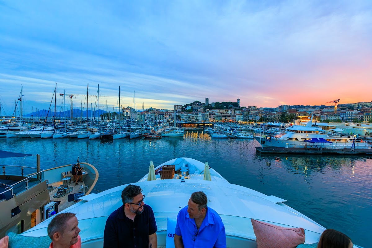 Sunset over Port de Cannes seen from the deck of Yacht Hana